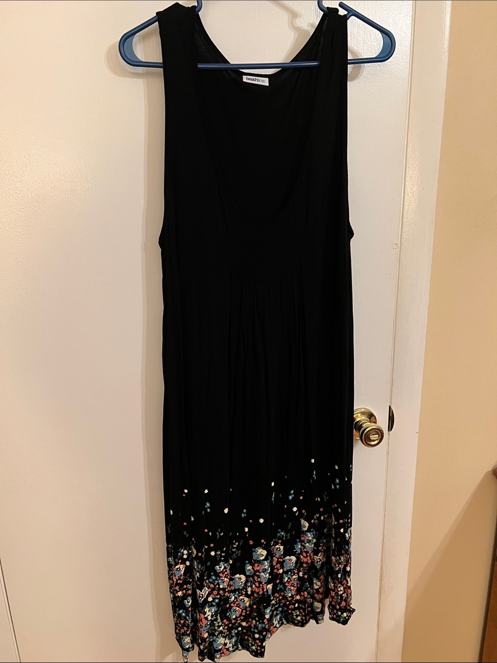 Sleeveless Black Maxi Dress with Floral Hem